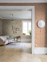 Bodri blommor och blad i grönt och orange